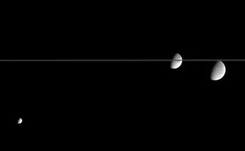 Cassini view of Mimas, Dione and Rhea near the ring plane (credit: NASA/JPL)